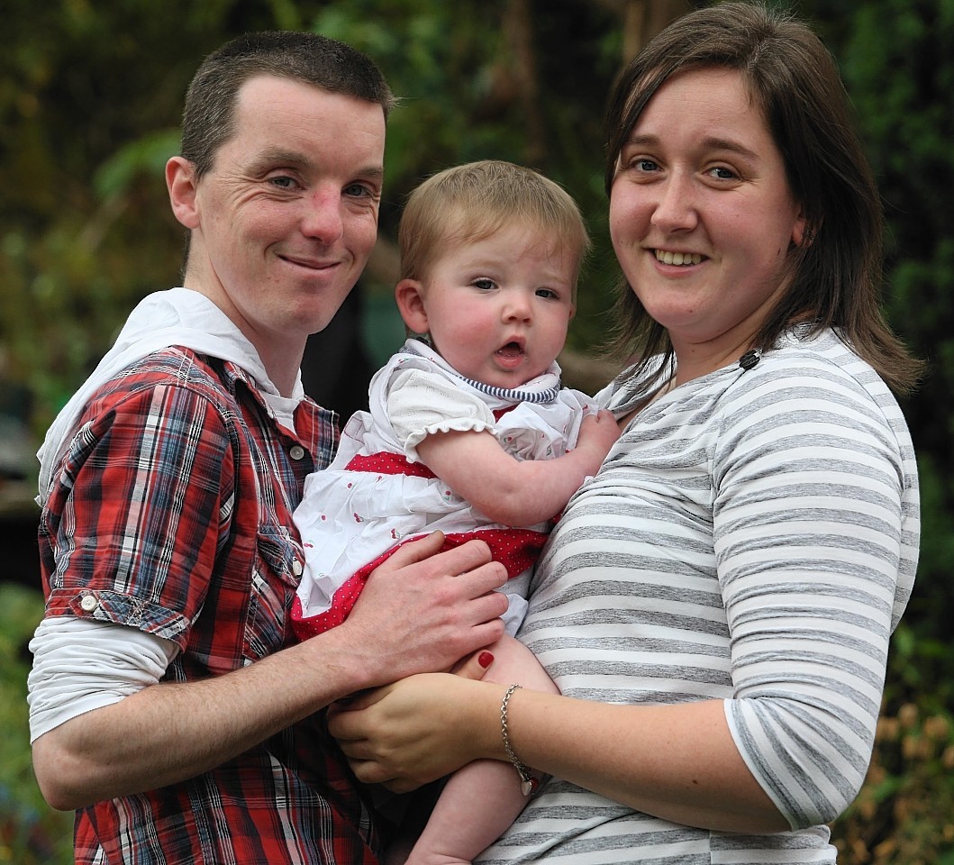 Rachel and Martin Philip with their daughter