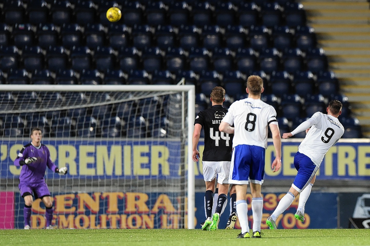 Peterhead's Rory McAllister (right) scores his side's fourth goal of the game