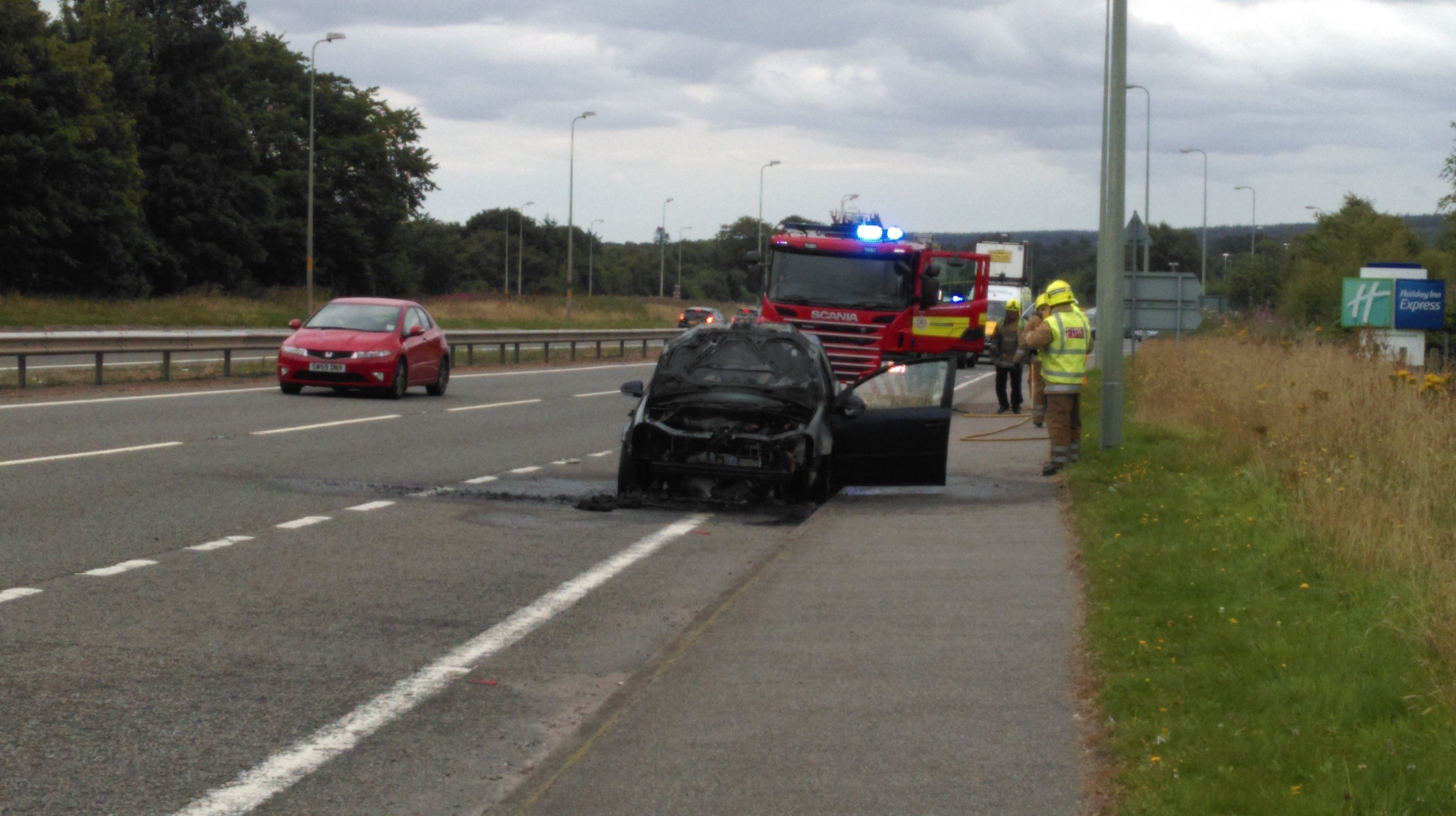 The remains of the car which caught fire on the A96