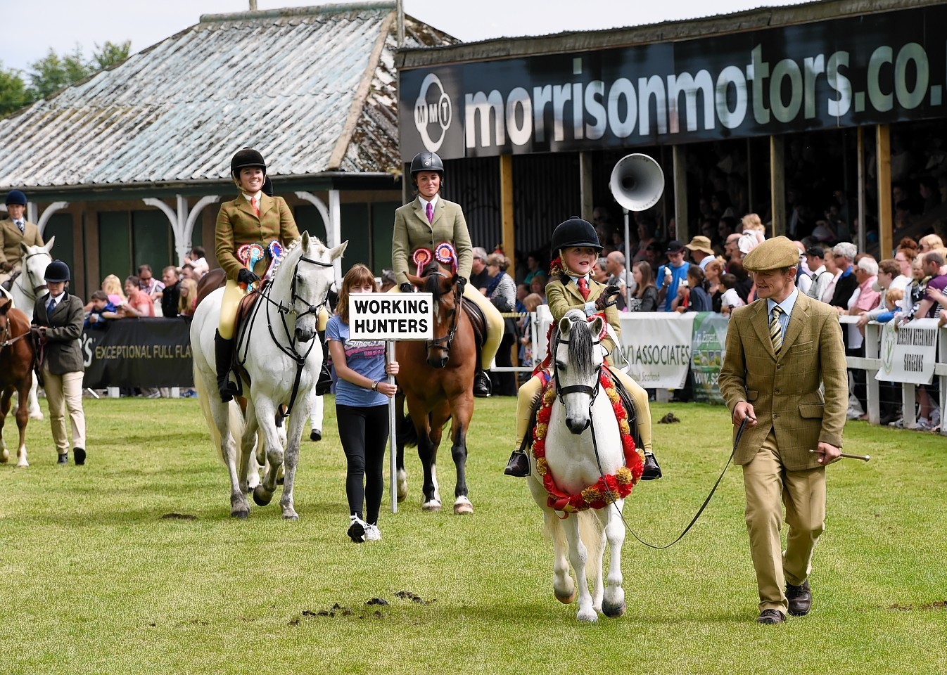 Overall horse champion (ridden class) Gwynrhosyn Demelza ridden by Rebecca Green and led by Charlie Cousens leading the horse parade at the Turriff Show. Picture by  Kevin Emslie