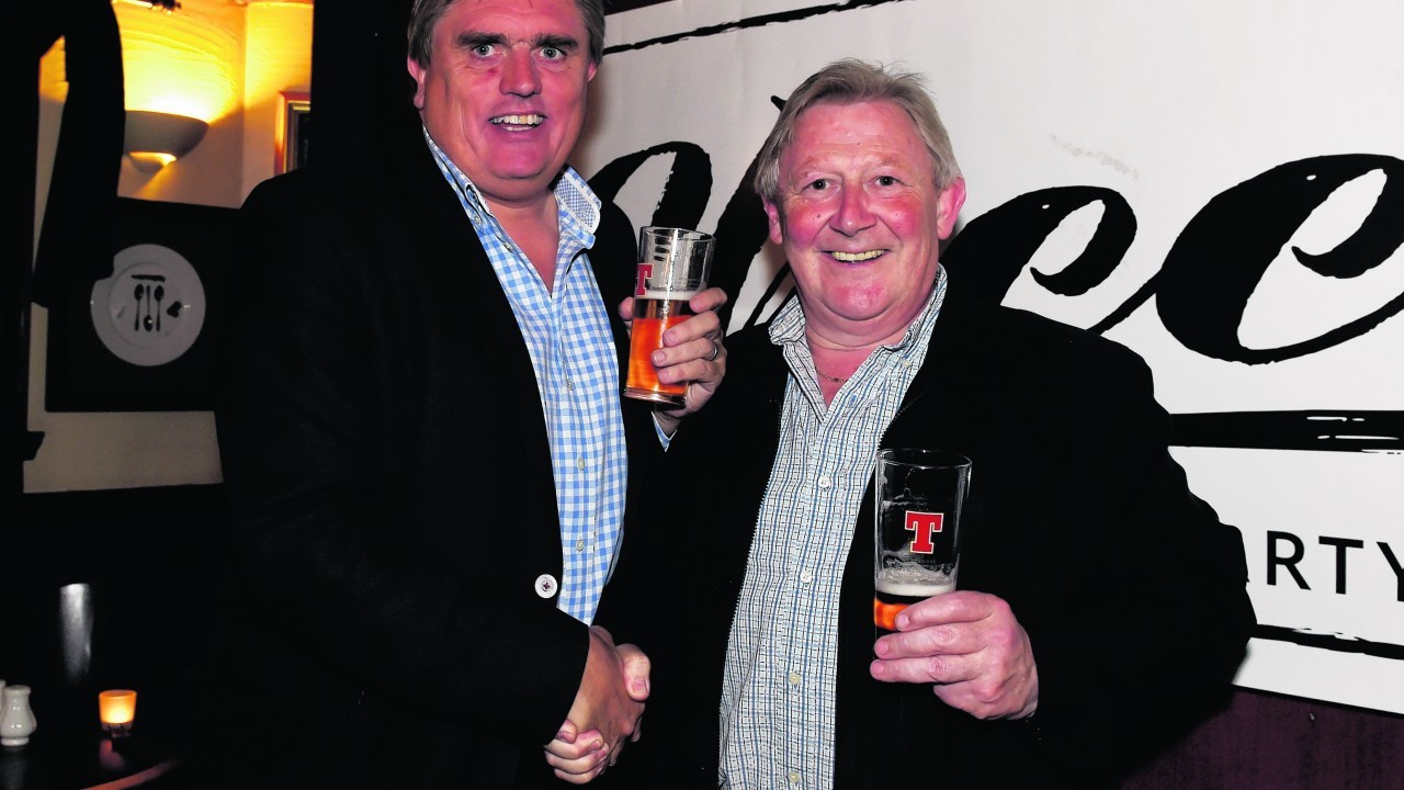 Allan Henderson, new owner and Mike Graham, previous owner.