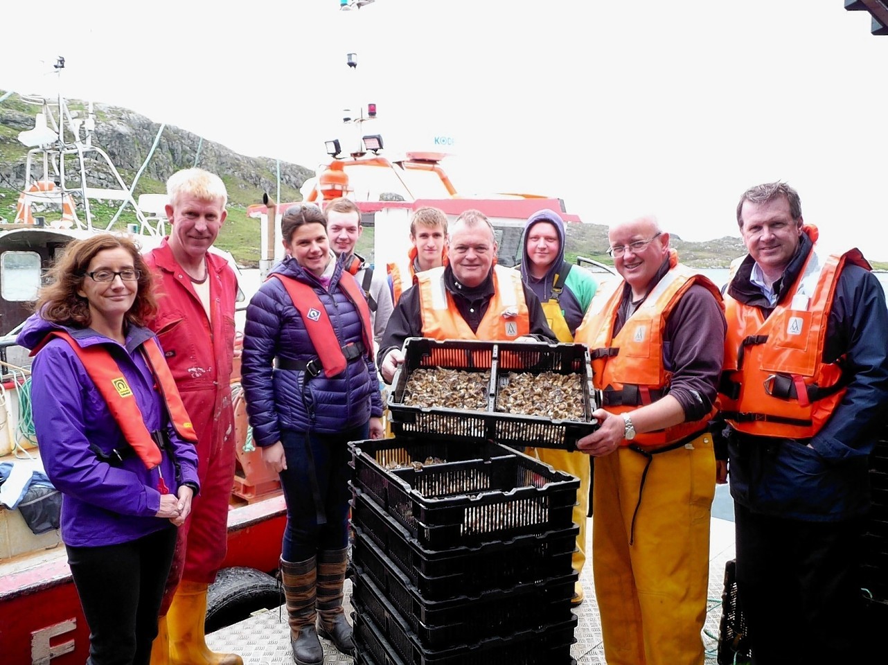 HIE director of business and sector development, Charlotte Wright (left) and chief executive, Alex Paterson (right), on a recent visit to Traigh Mhor Oysters