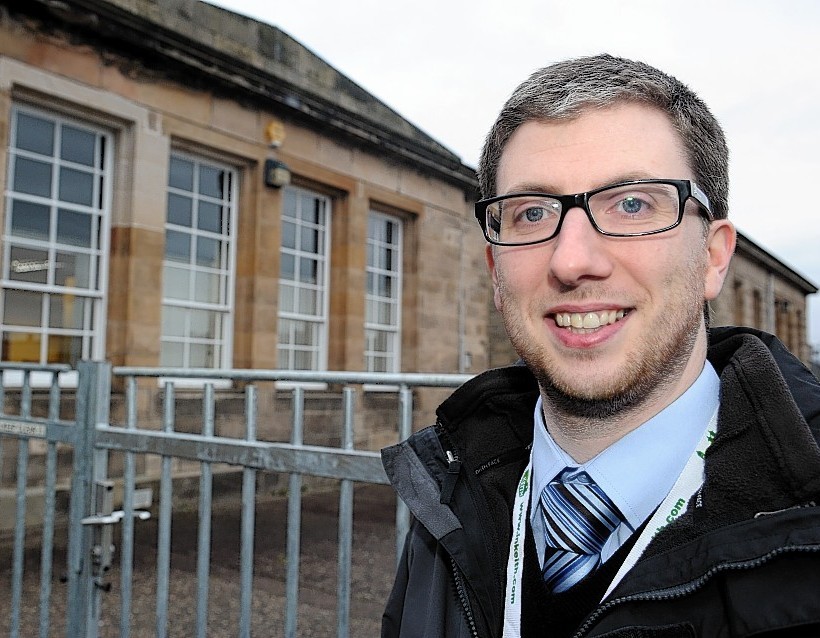 Councillor Gary Coull beside the Moray Heritage Centre, Elgin