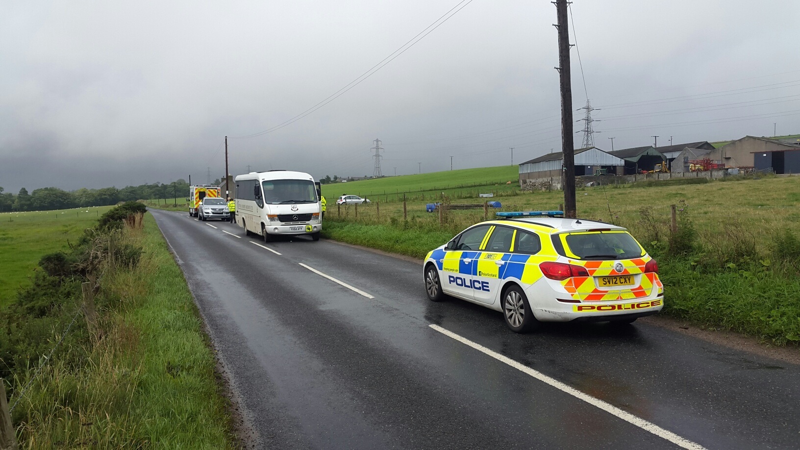 A woman has been injured in a crash between a car and a bus