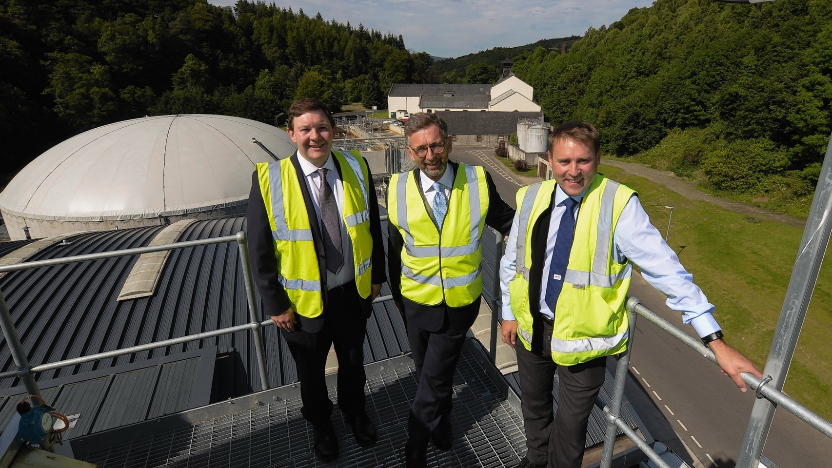 Lord Dunlop surveys the bioenergy plant with Keith Miller (left) and  Sean Pritchard (right)