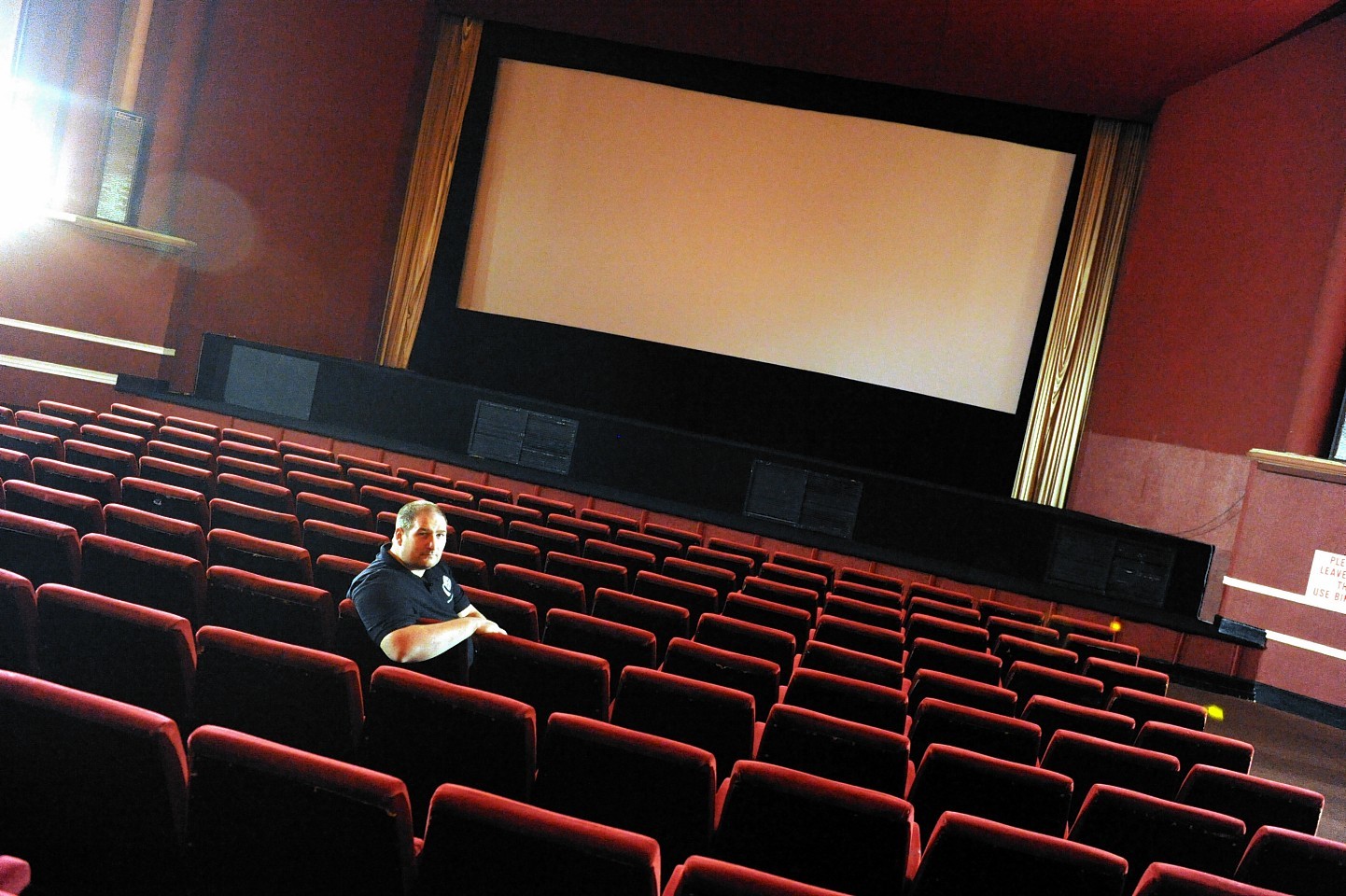 Martin Thomson, manager of the Moray Playhouse Cinema, Elgin, in the auditorium of the cinema.