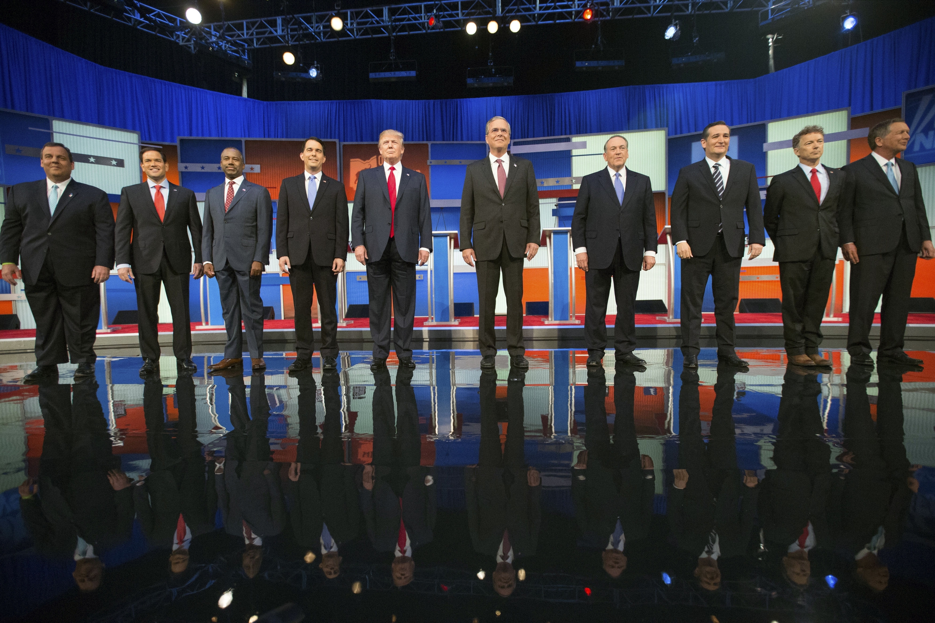 Republican presidential candidates from left, Chris Christie, Marco Rubio, Ben Carson, Scott Walker, Donald Trump, Jeb Bush, Mike Huckabee, Ted Cruz, Rand Paul, and John Kasich take the stage for the first Republican presidential debate at the Quicken Loans Arena. 