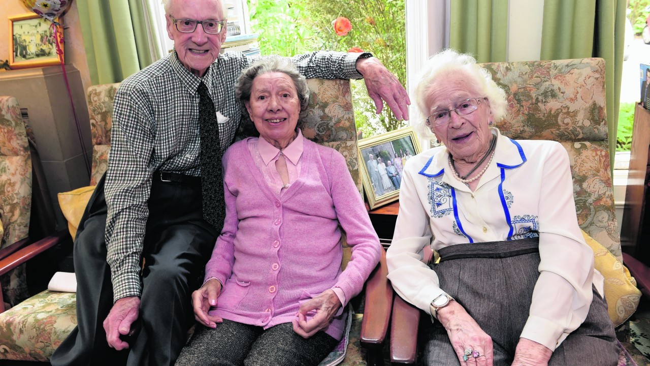 Residents Bob and Muriel Robert with Willa Jack
