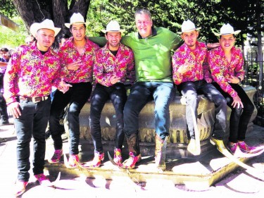  Stephen Fry with the "pointy boot cowboys " of Real De Catorce Mexico