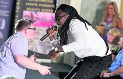 Andrew Laing gets up and gets down with entertainer Rudebone