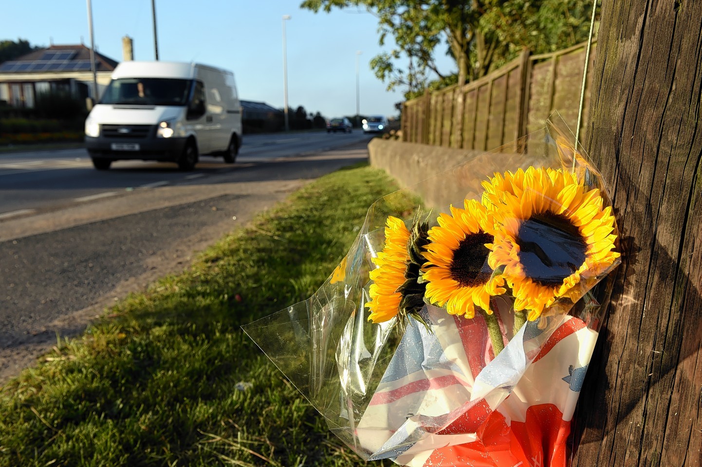 Floral tributes on the A90 at the scene of a fatal crash just north of Balmedie