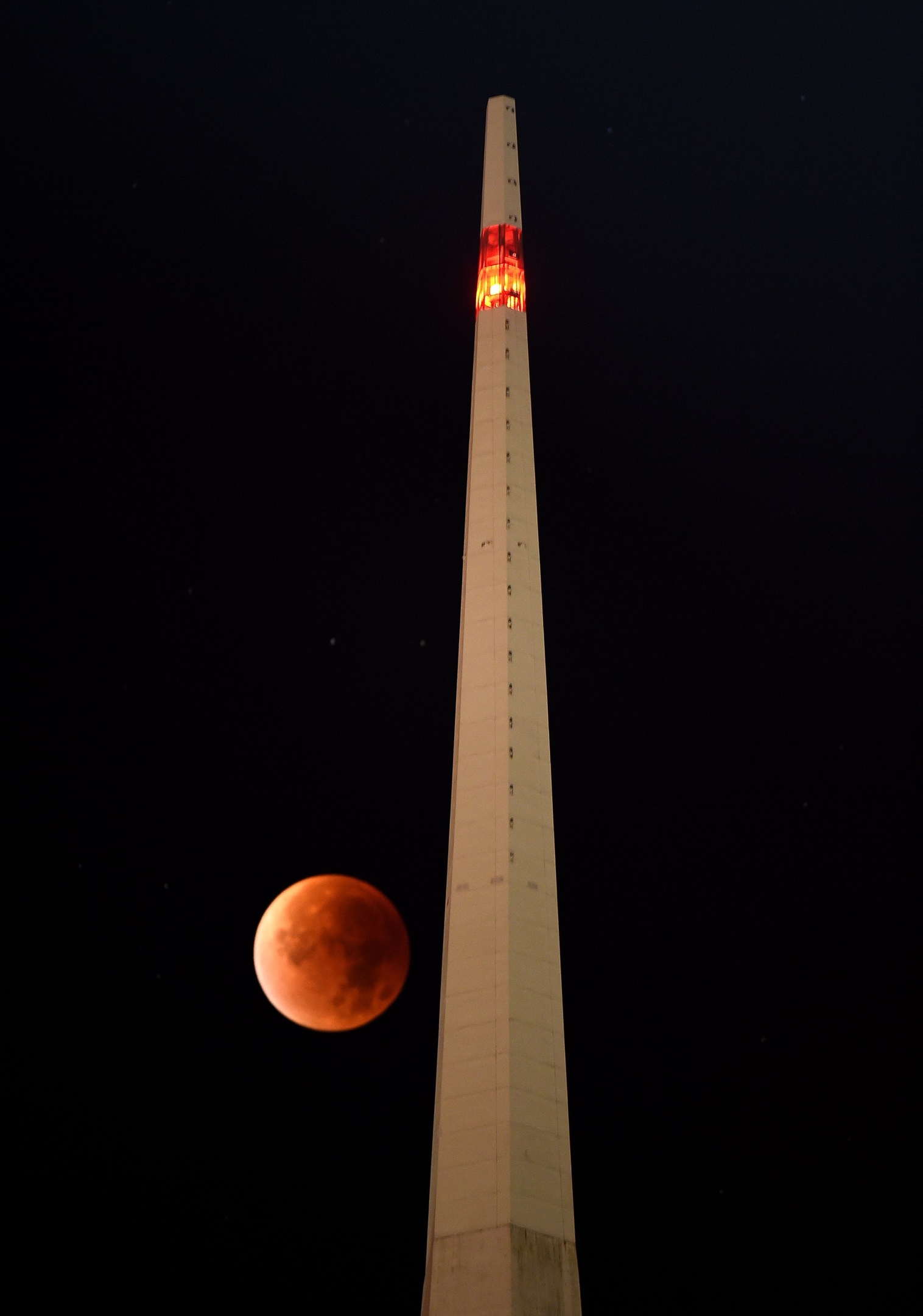 A blood red "supermoon" in the skies by the Spinnaker Tower, Portsmouth