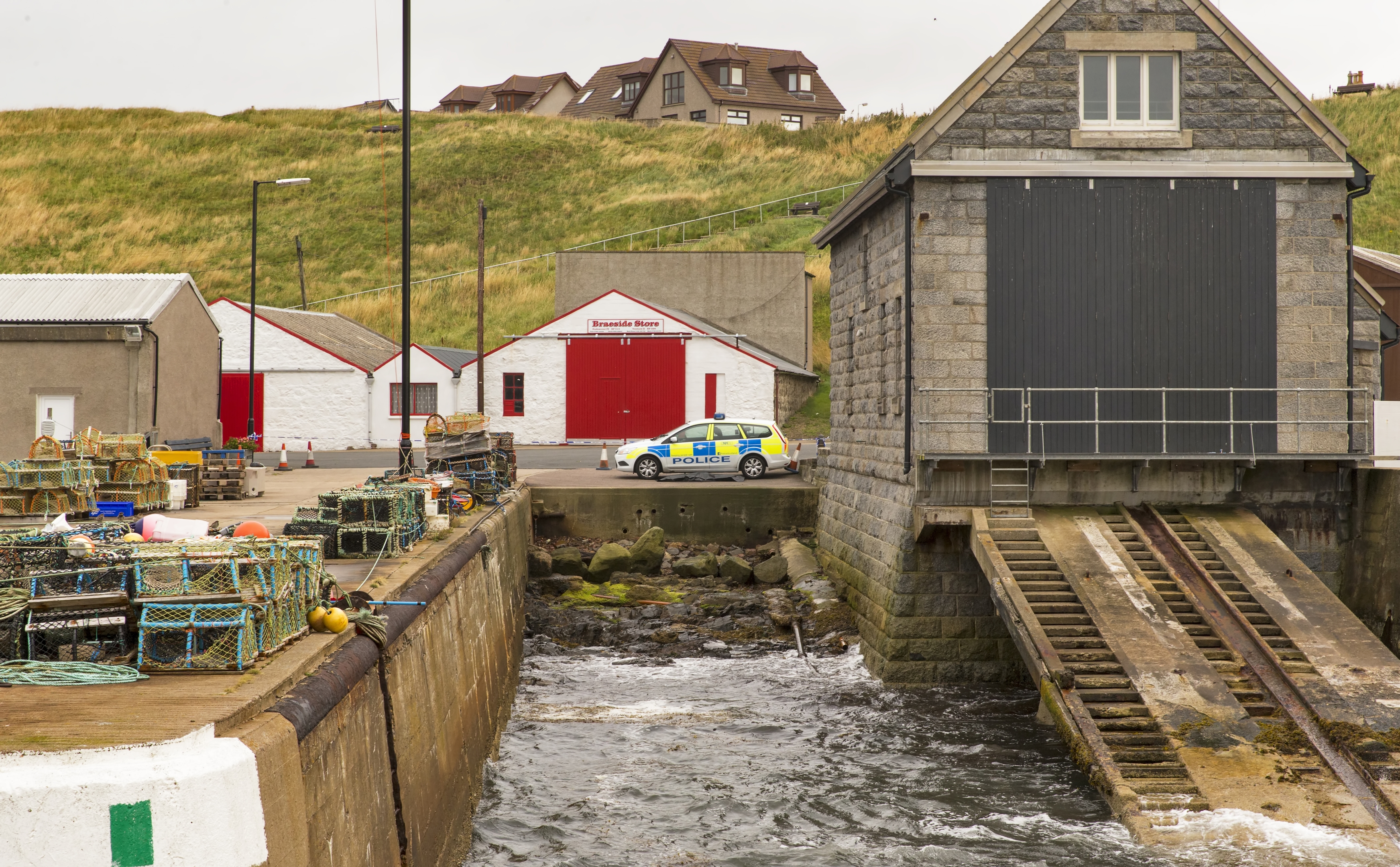 Exactly where the body was found between pier and boat launch.