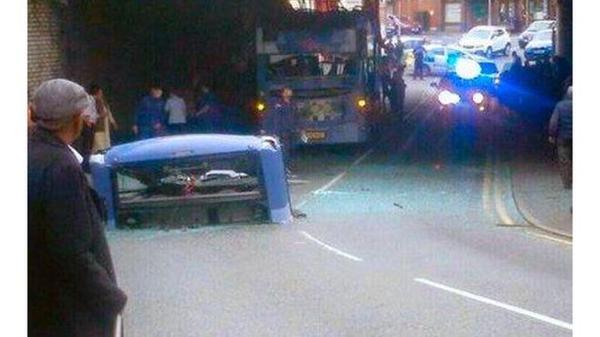 The roof was ripped off the bus as it crashed into a bridge in Rochdale