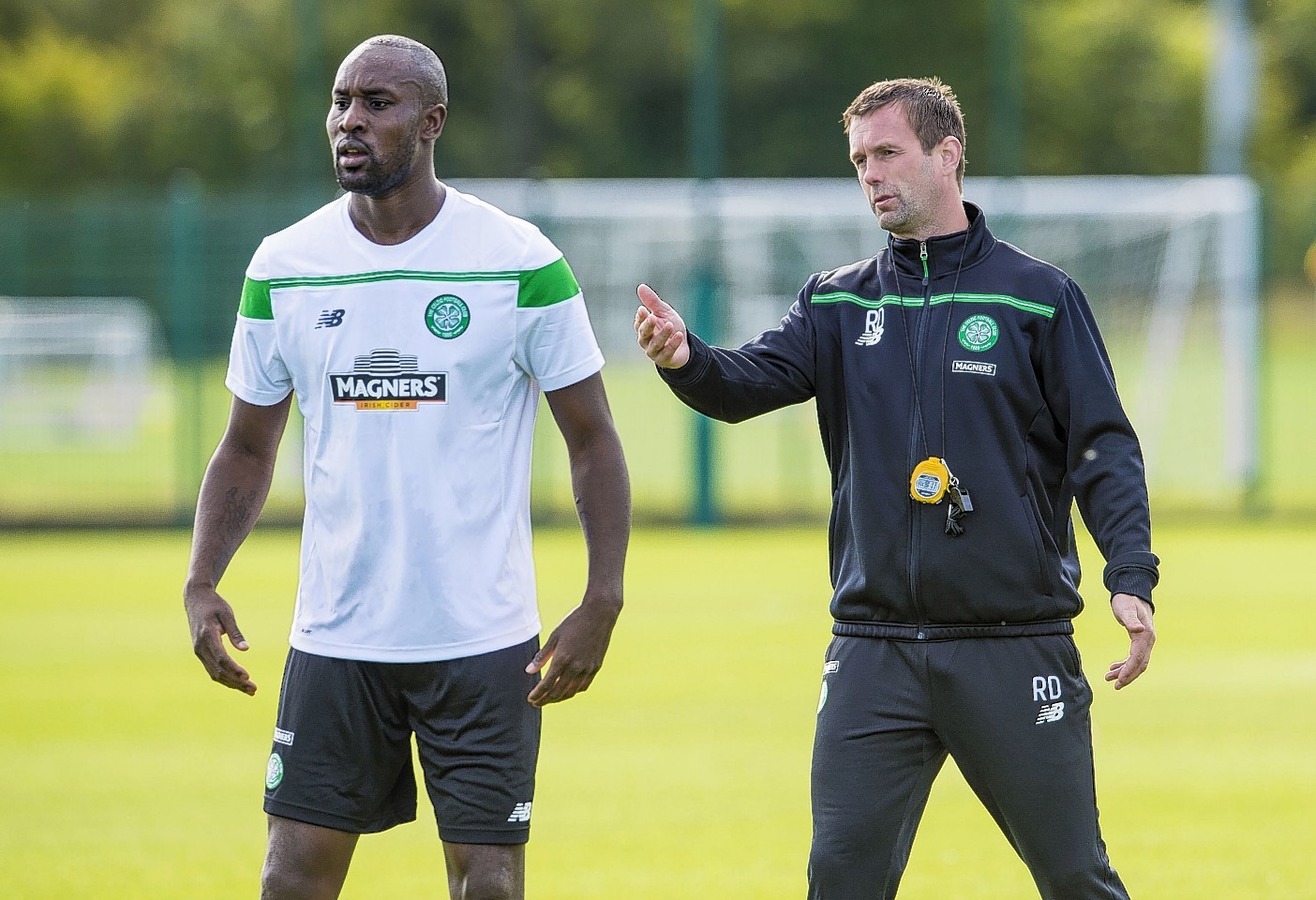 Carlton Cole training at Celtic's Lennoxtown base with manager Ronny Deila
