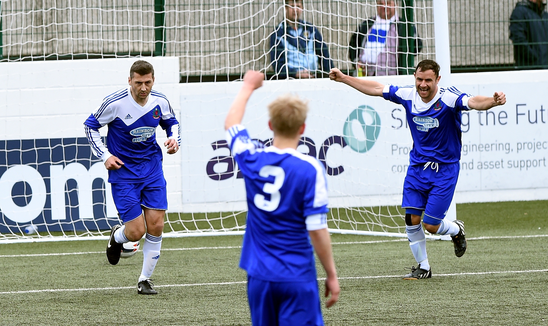 Cove scorer Roy McBain and team mate Jamie Watt celebrate after scoring against Banks o' Dee. Picture by Kevin Emslie