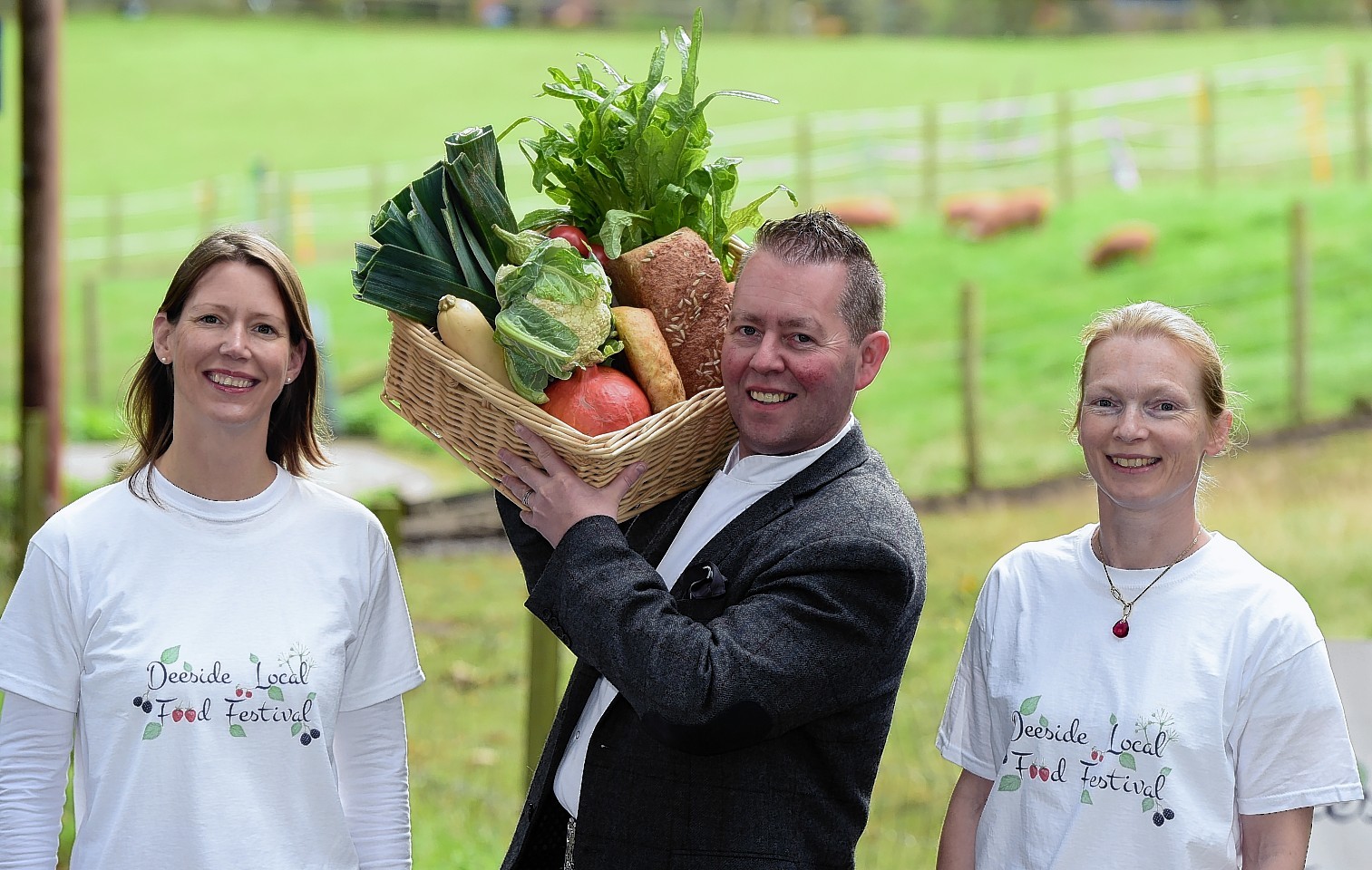 The Kilted Chef, Craig Wilson, of Eat on the Green, with organisers Sarah Misra (left) and Rachel Gambro (right).    
Picture by Kami Thomson