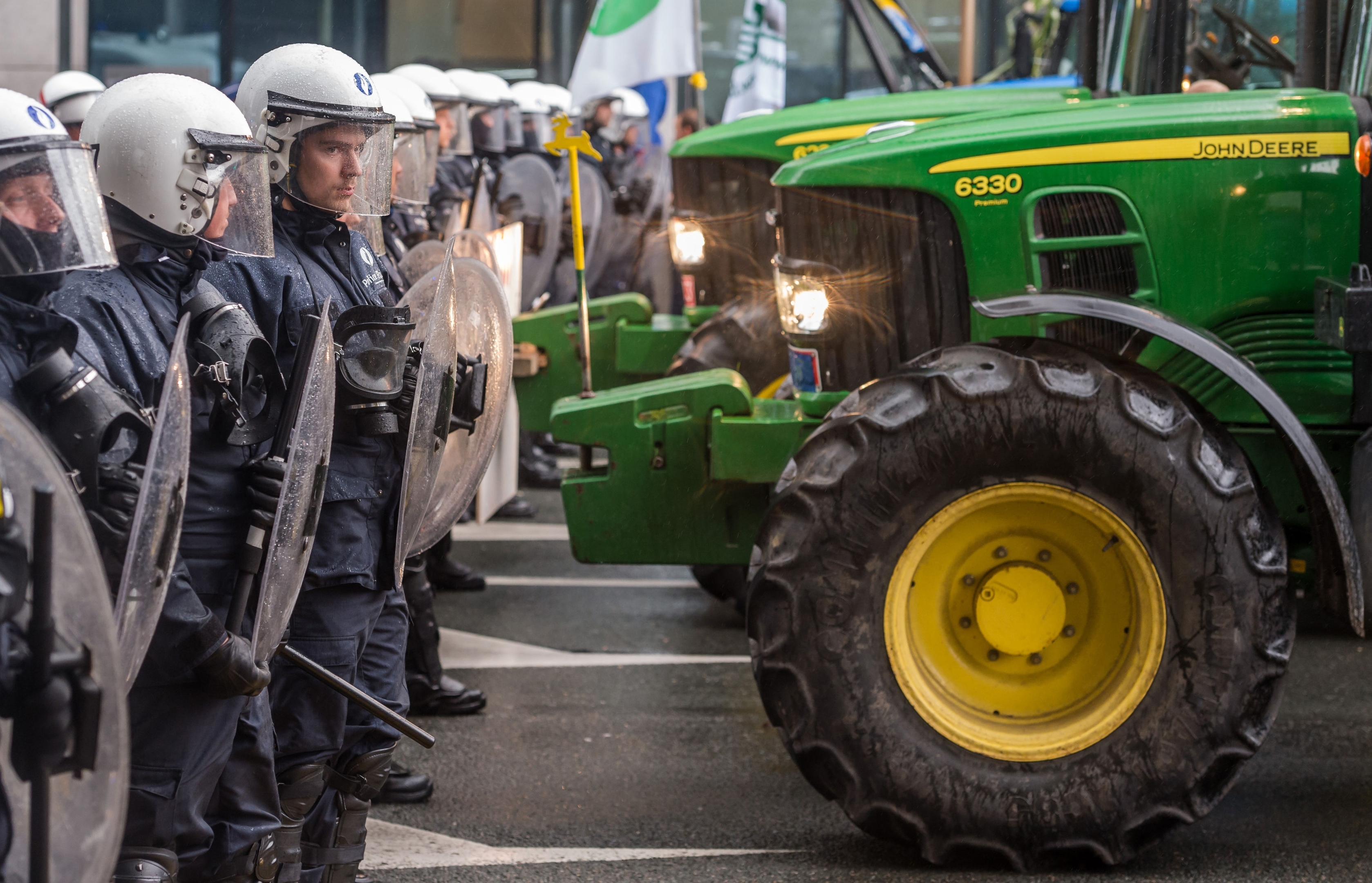 Police officers face off with farmers