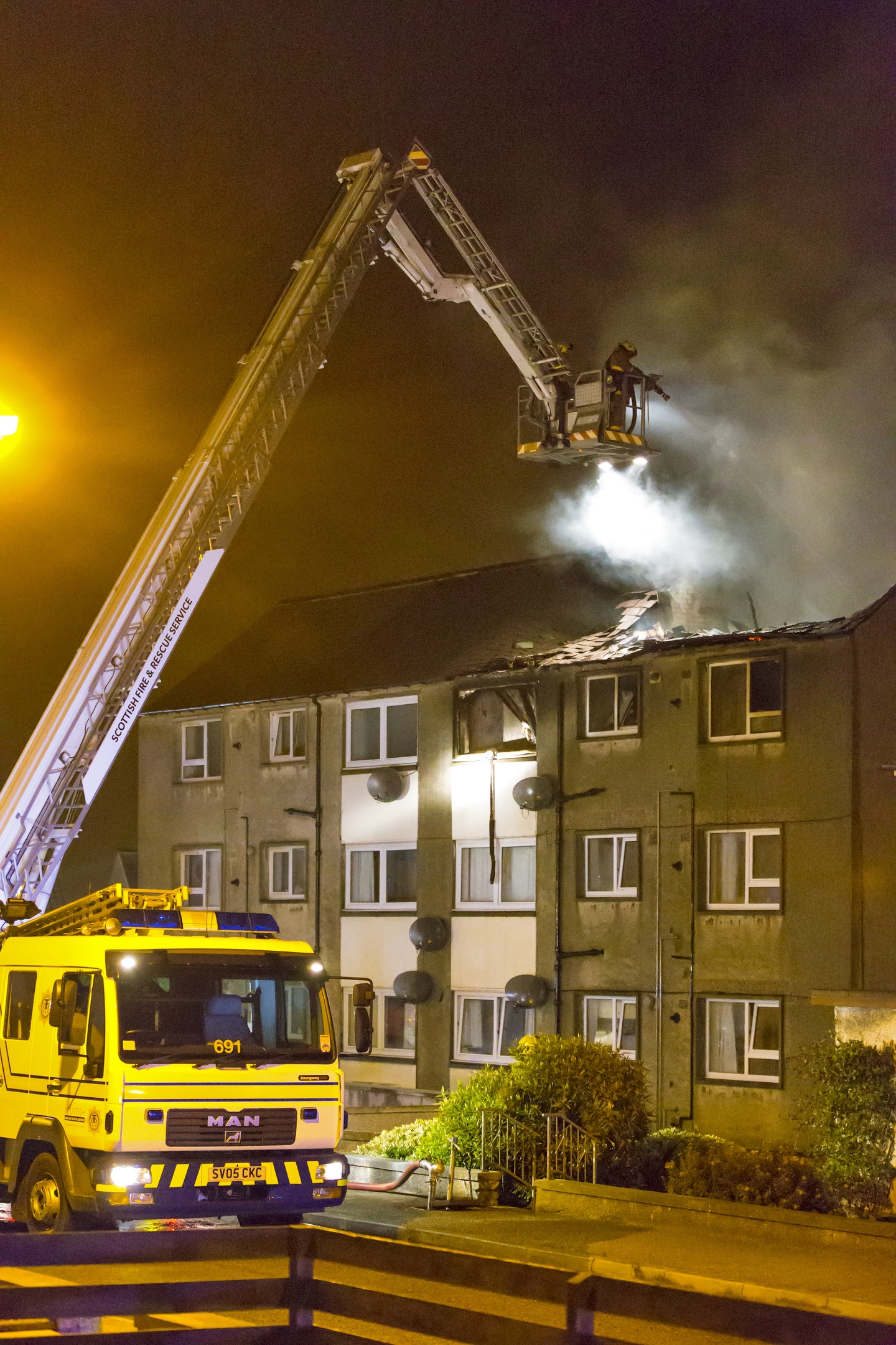 Local residents said that at least one resident of the building had to be rescued by ladder 