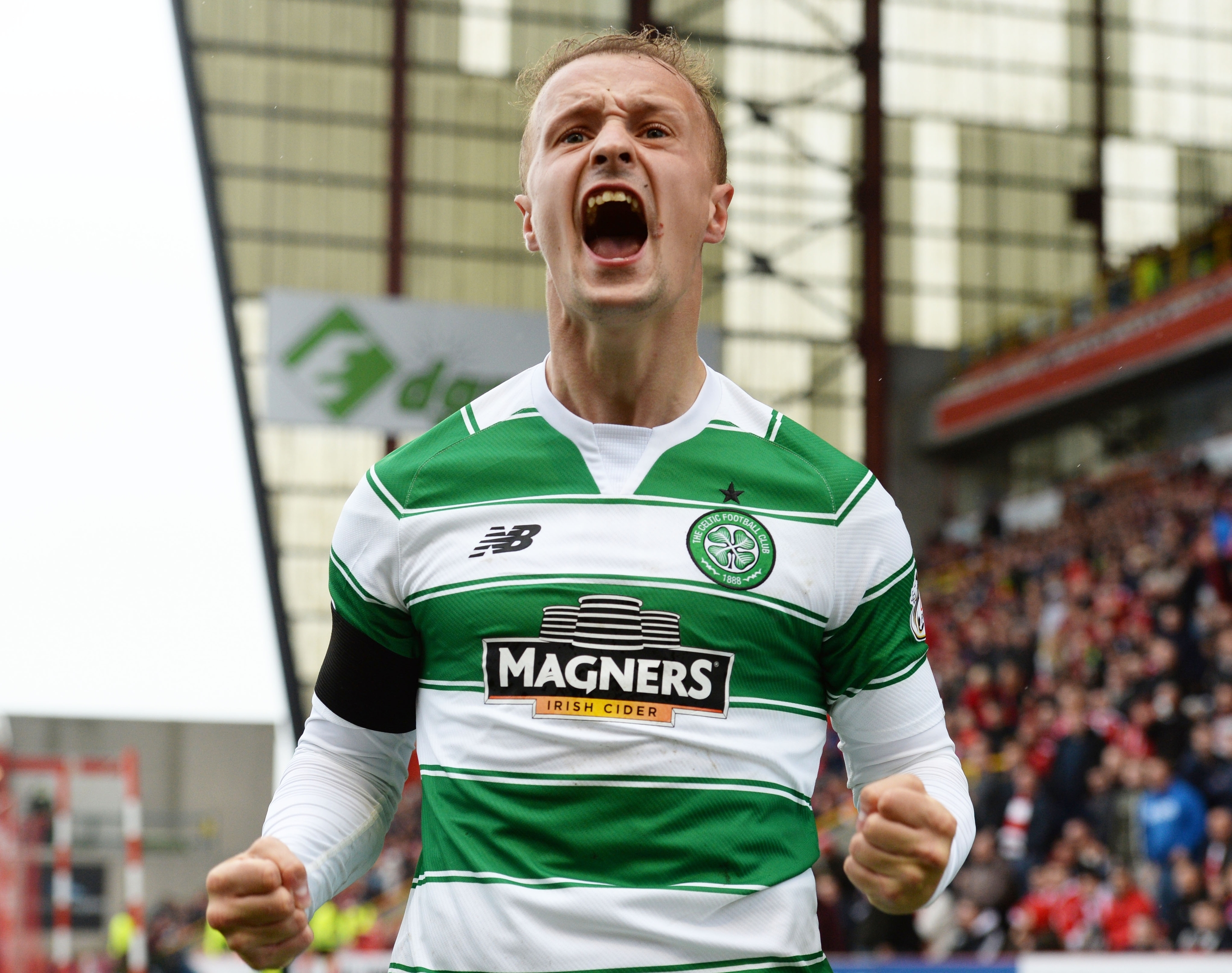 Celtic's Leigh Griffiths celebrates after opening the scoring