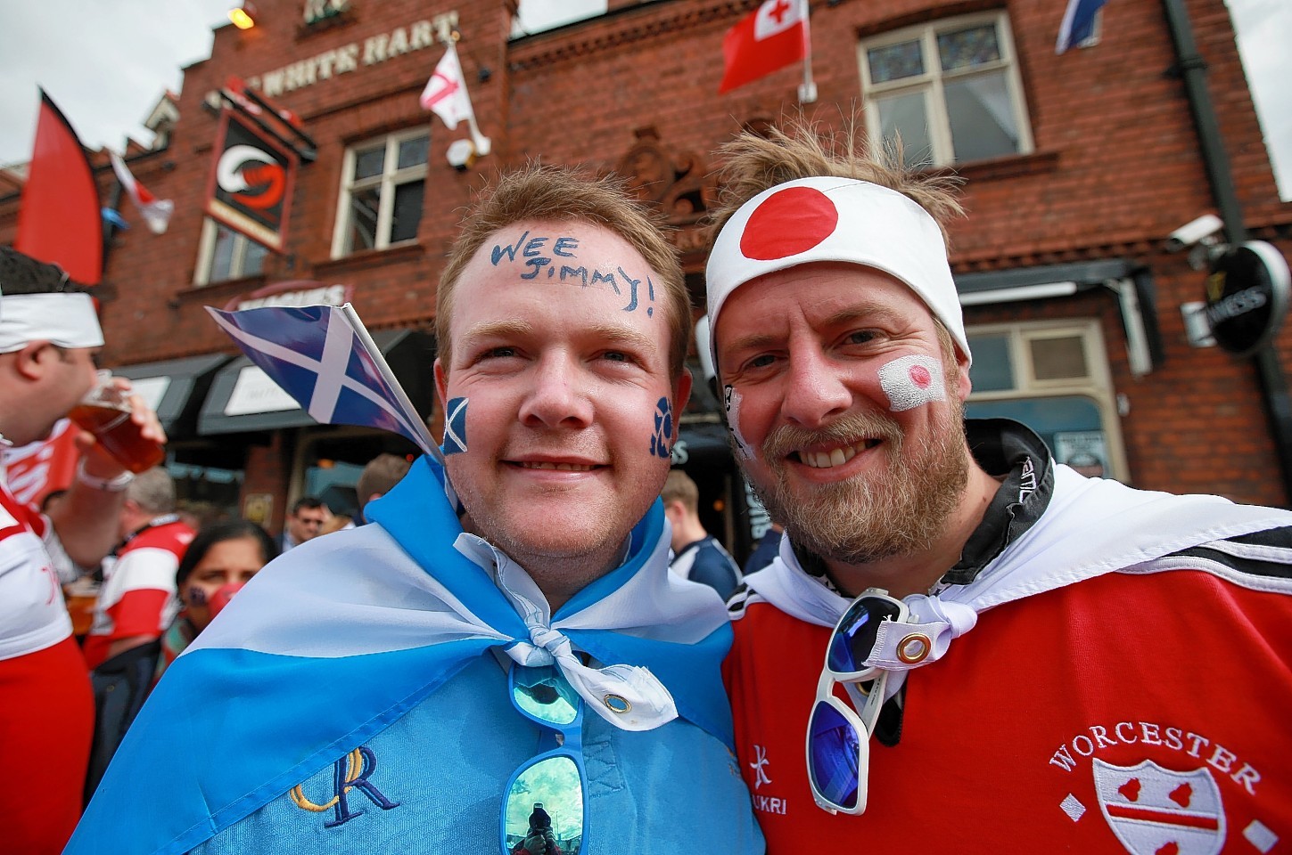 Scotland and Japan fans before the Rugby World Cup match at the Kingsholm Stadium