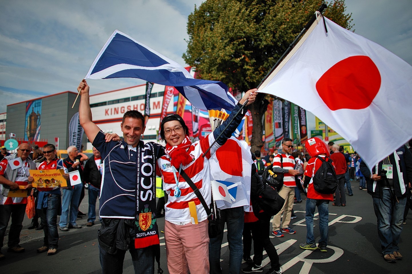 Scotland and Japan fans before the Rugby World Cup match at the Kingsholm Stadium