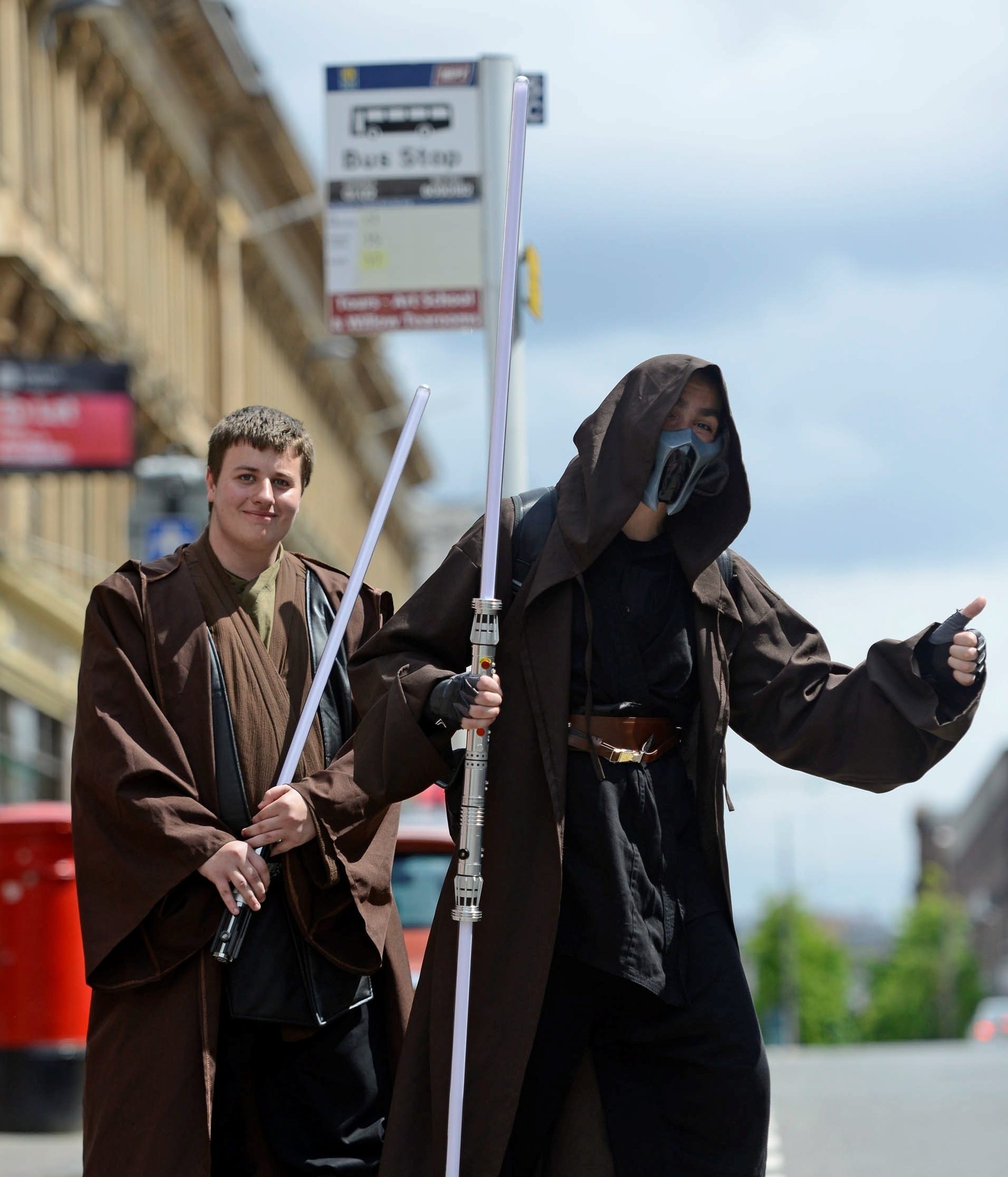 Two Jedi wait for a bus in Scotland