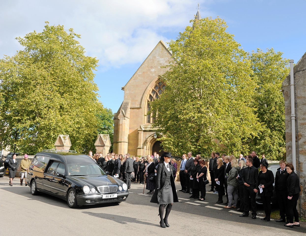 The funeral cortege leaves the Cathedral for Proncynain
