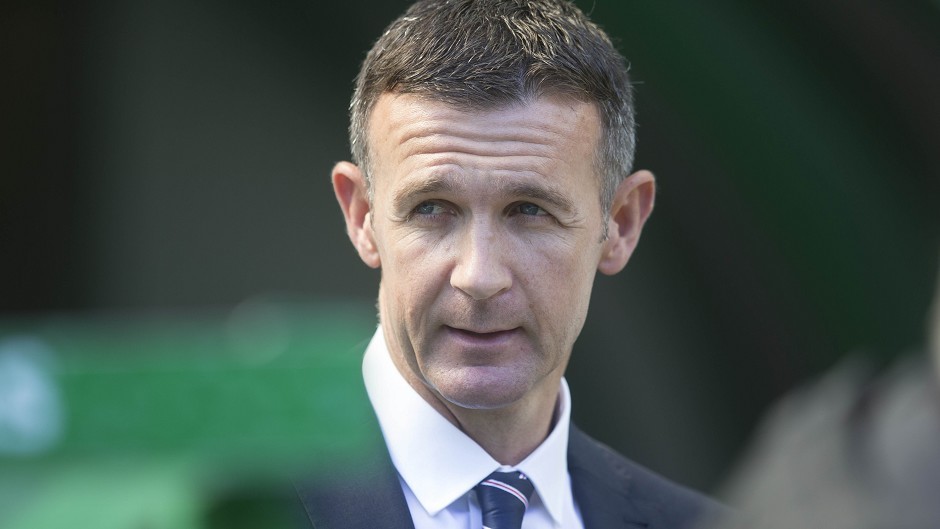 Jim McIntyre says he is happy at Ross County, after being linked with the Dundee United job.