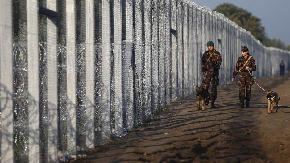 Hungarian soldiers patrol the border line with Serbia 