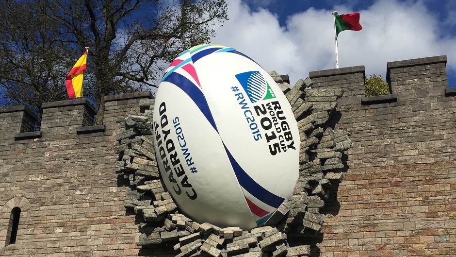 A giant rugby ball on the walls of Cardiff Castle to mark the start of the Rugby World Cup (PA)