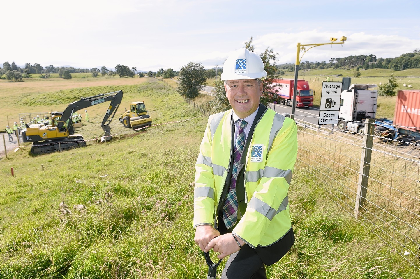 Scottish Government Minister Keith Brown at Kincraig to mark the start of work on dualling, the first section opened yesterday