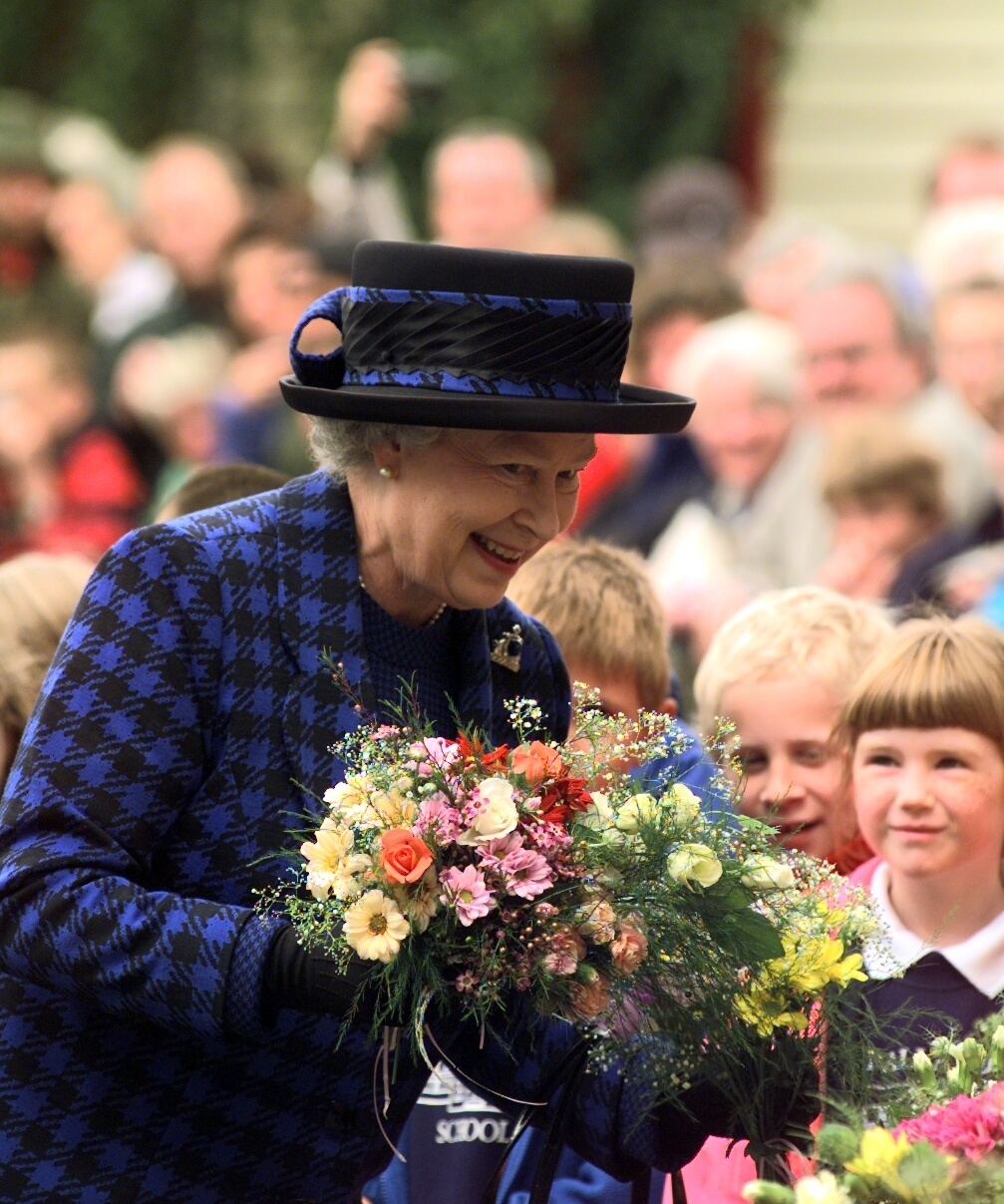 Receiving flowers from subjects 