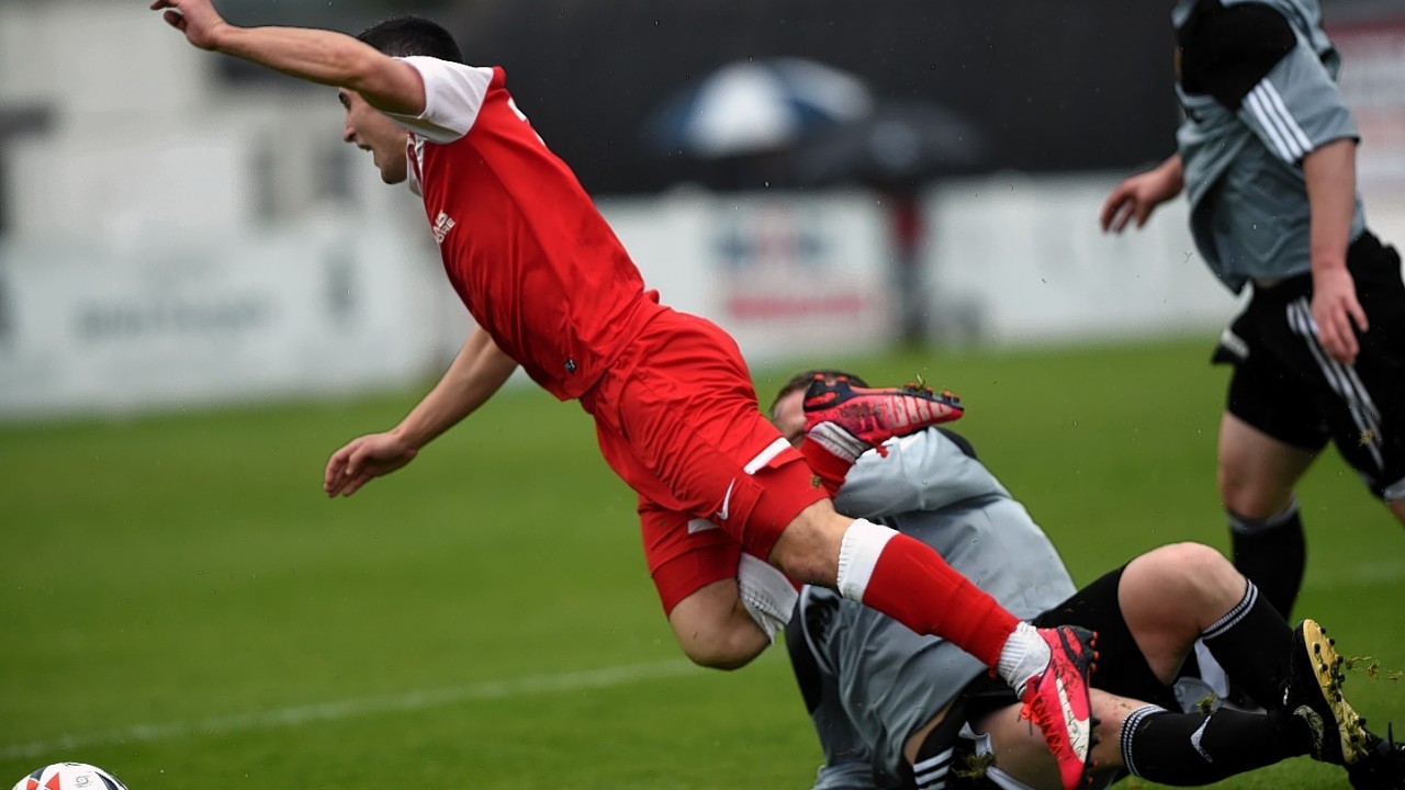 And just so the Brora and Formartine players aren't feeling left out... Here's Formartine's Neil McVitie challenging Brora's Andrew Greig this afternoon