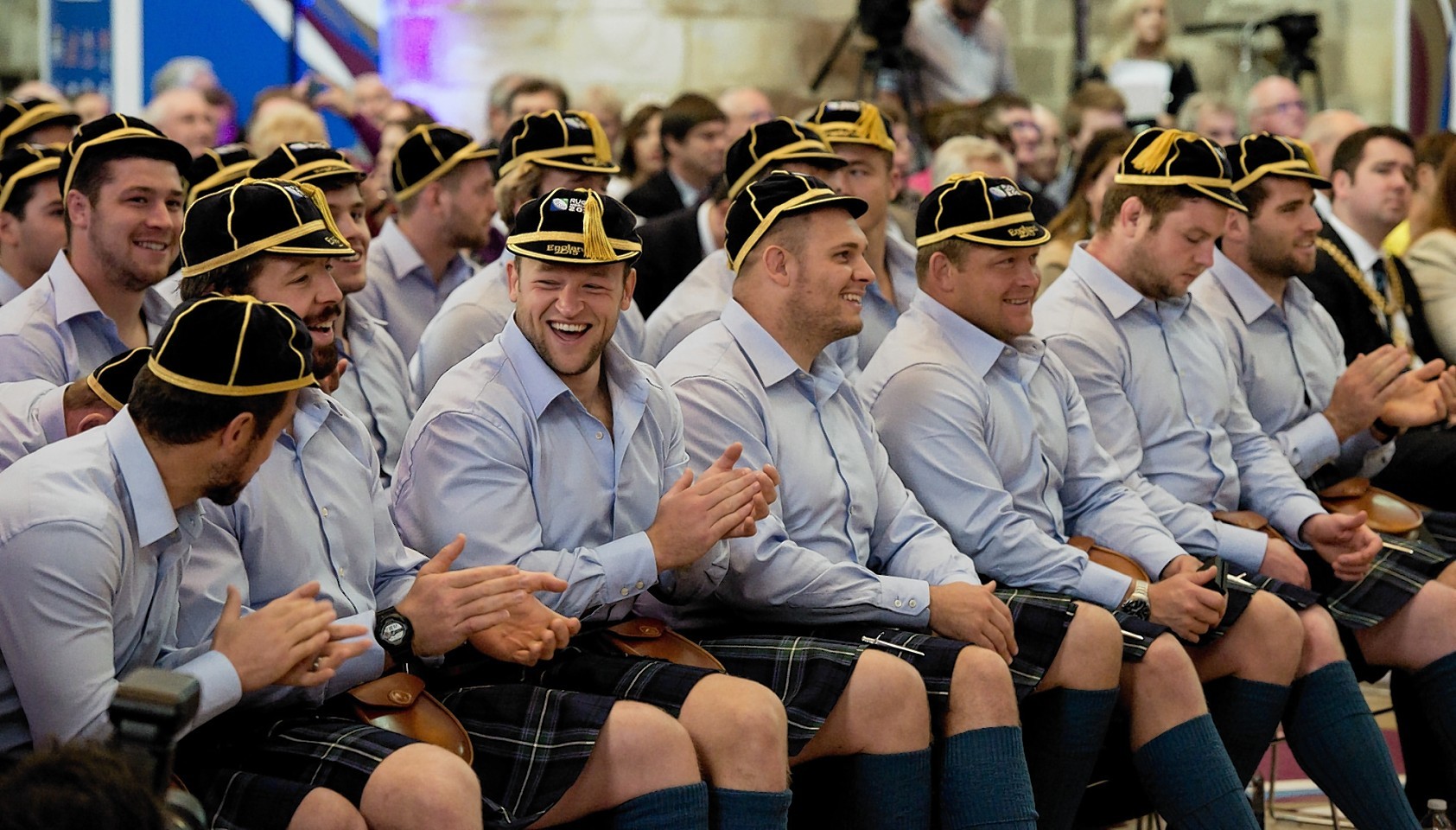 Scotland players with their World Cup caps during the RWC 2015 Welcome Ceremony