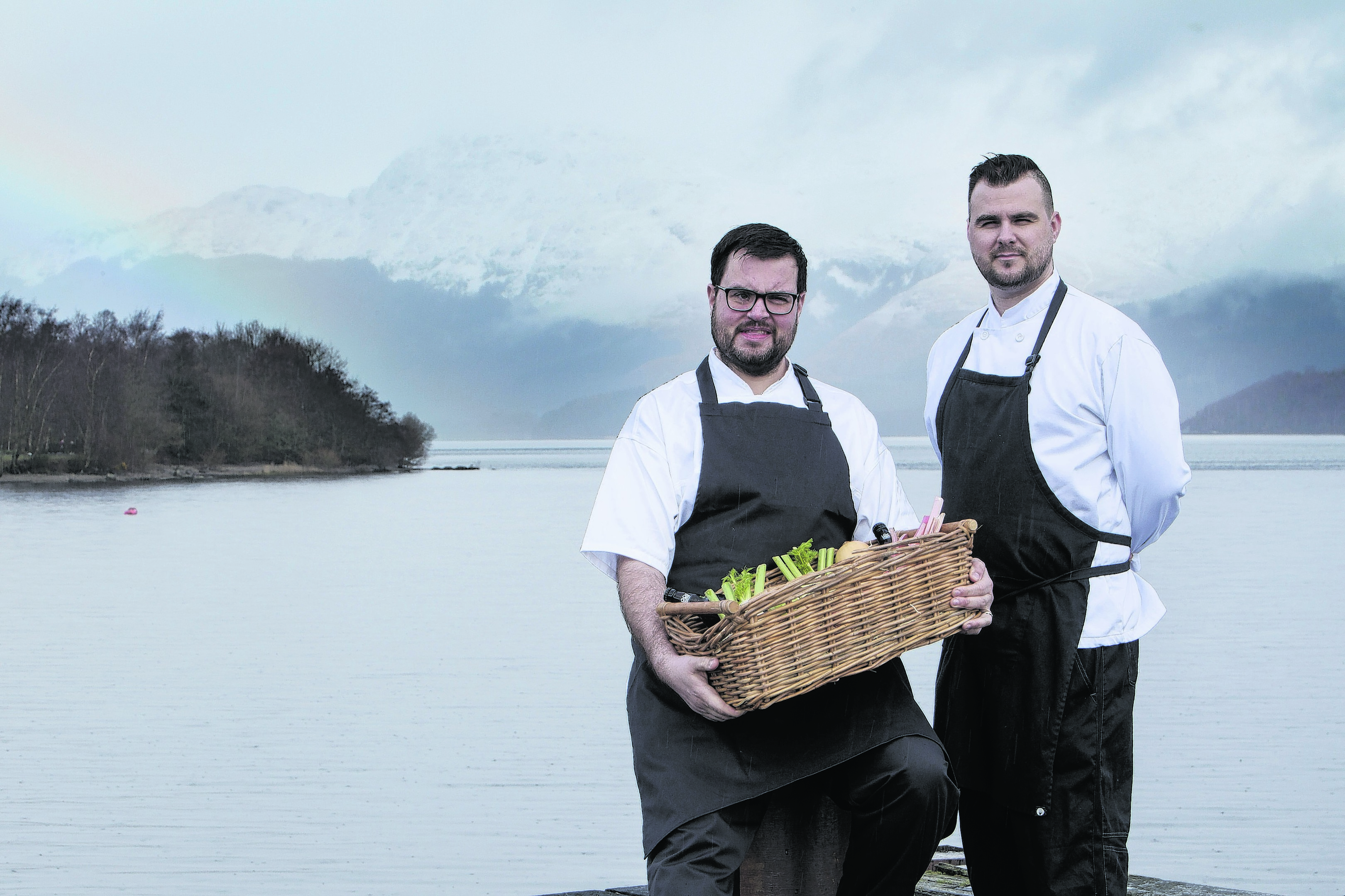 Allan McLaughlin, head chef, left, and sous chef David Hetherington with the backdrop of Ben Lomond in Loch Lomond and Trossachs National Park