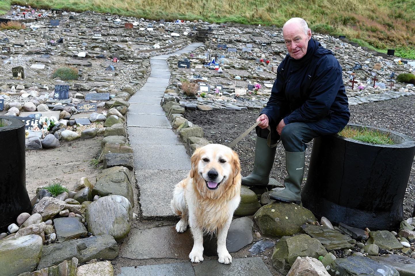 Stehen Findlay at the cemetery with Alfie, a friend's dog. Picture by Gordon Lennox 