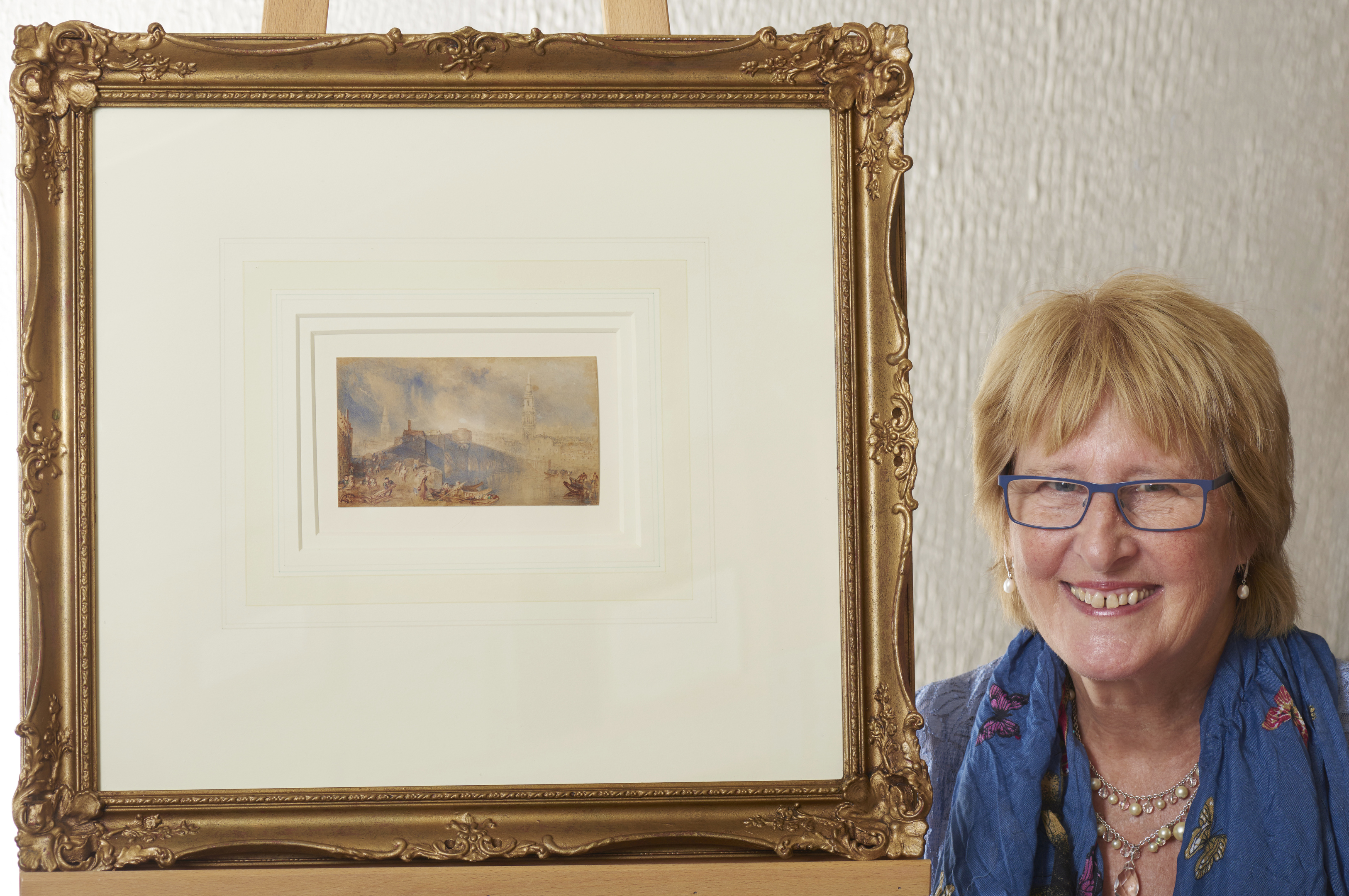 Susan Pianta-Scott, Treasurer of the Art Fund Highland Branch, with Turner's watercolour of Ness Bridge