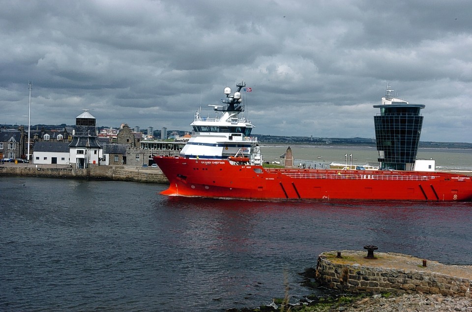 A supply boat arrives at Aberdeen Harbour.