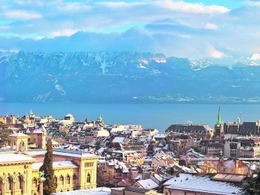 Wintry panorama on Lausanne, the lake, the mountains