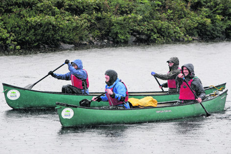 Monster Paddle participants brave the stormy weather