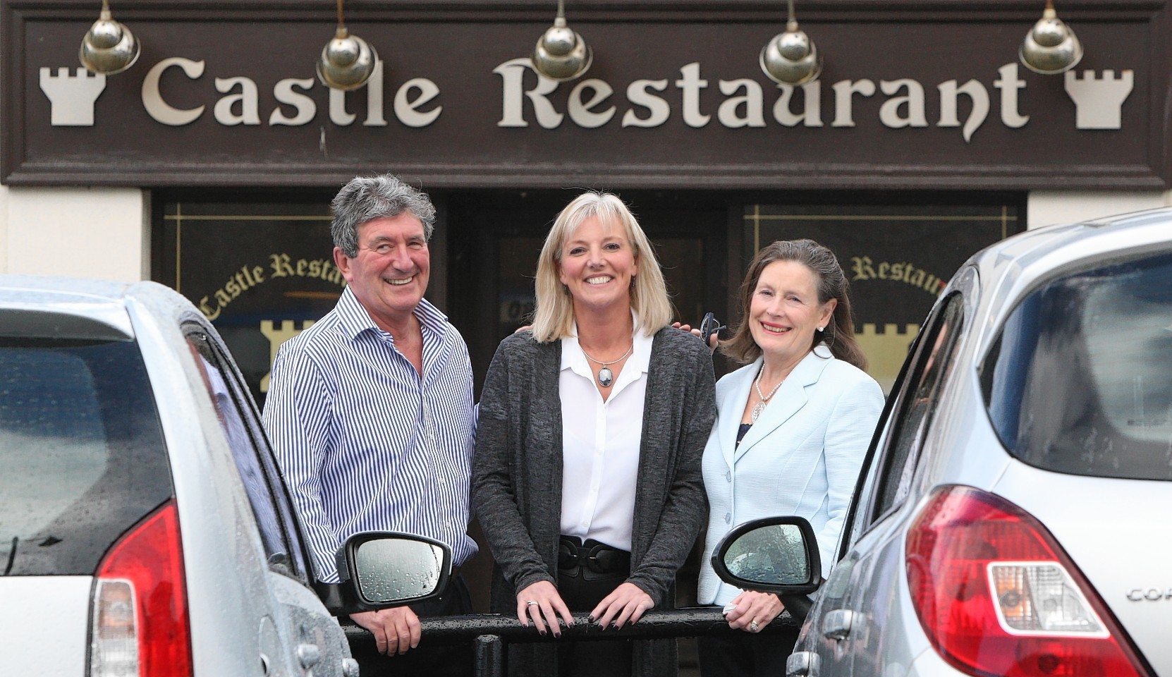 Katie MacKinnon, middle, new owner of the Castle Restaurant in Inverness, with previous owners Christine and Brian Lipton.