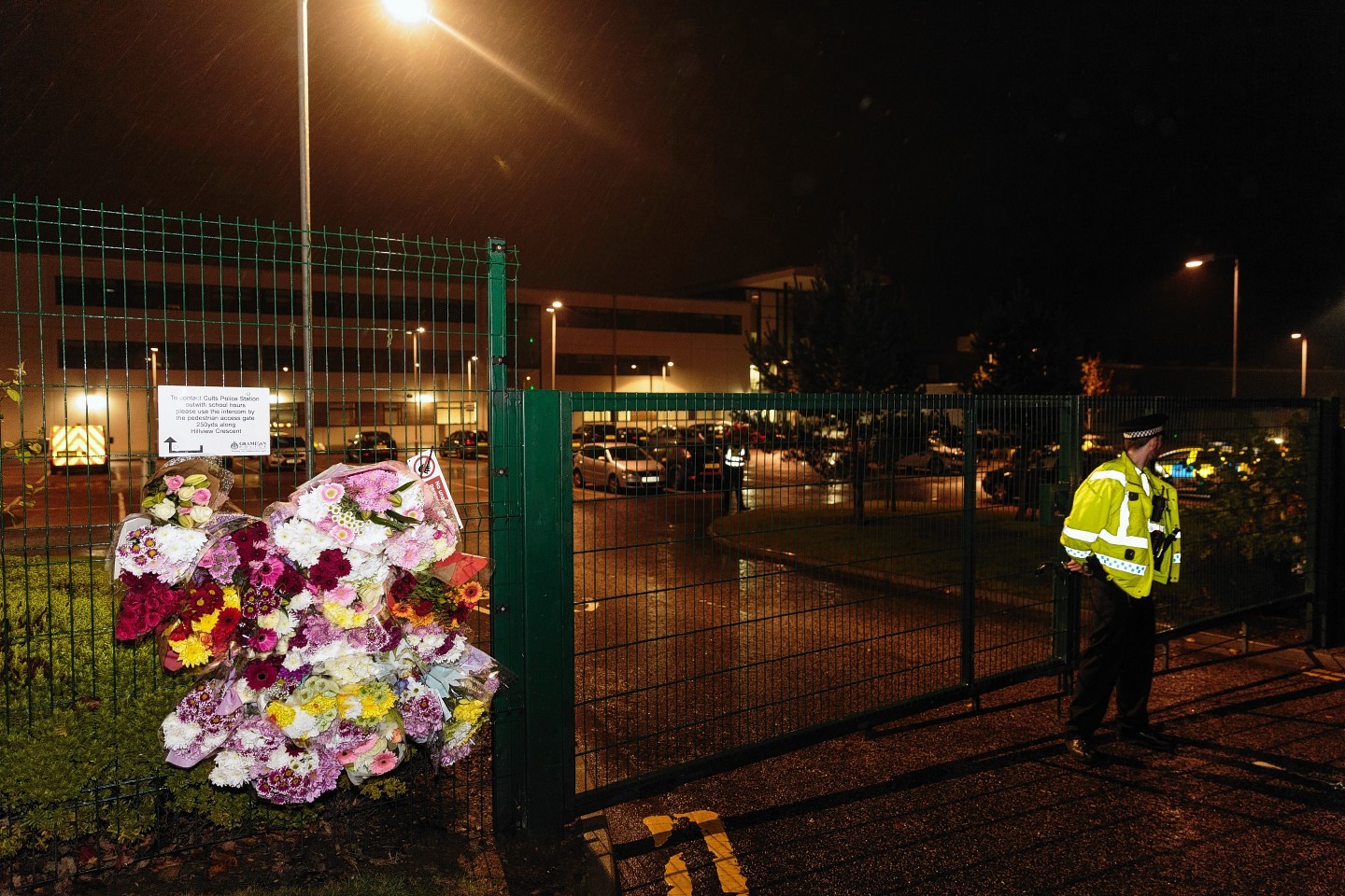 More floral tributes at the gates to Cults Academy