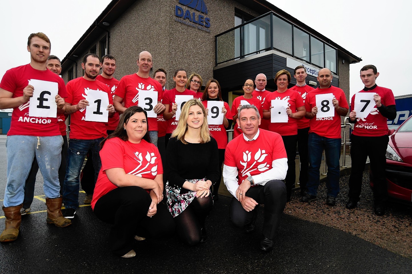 Staff at Dales Engineering, Peterhead, who raised £13096.87 for Friends of Anchor