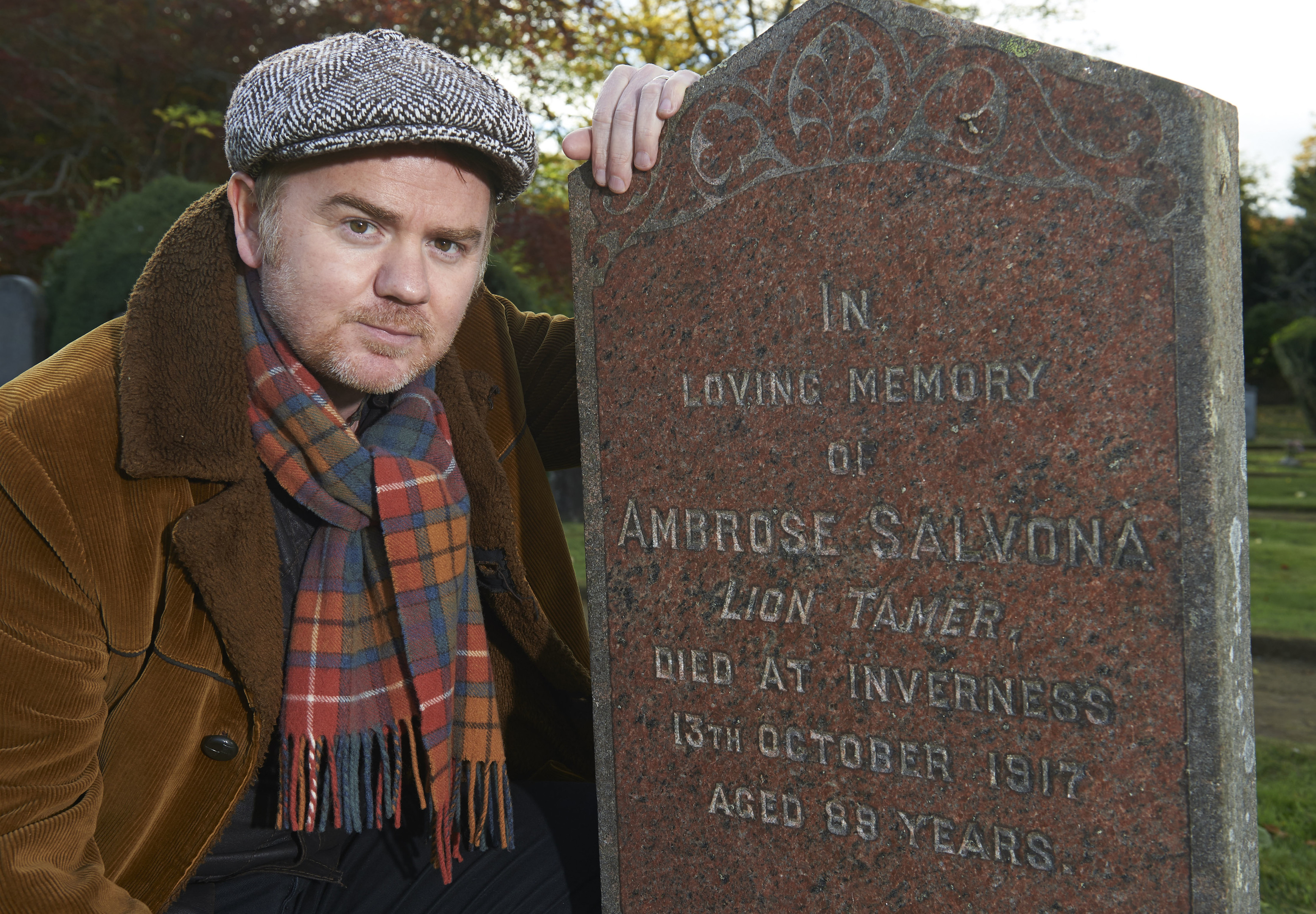 Dean Owens at the grave of his lion taming great granfather