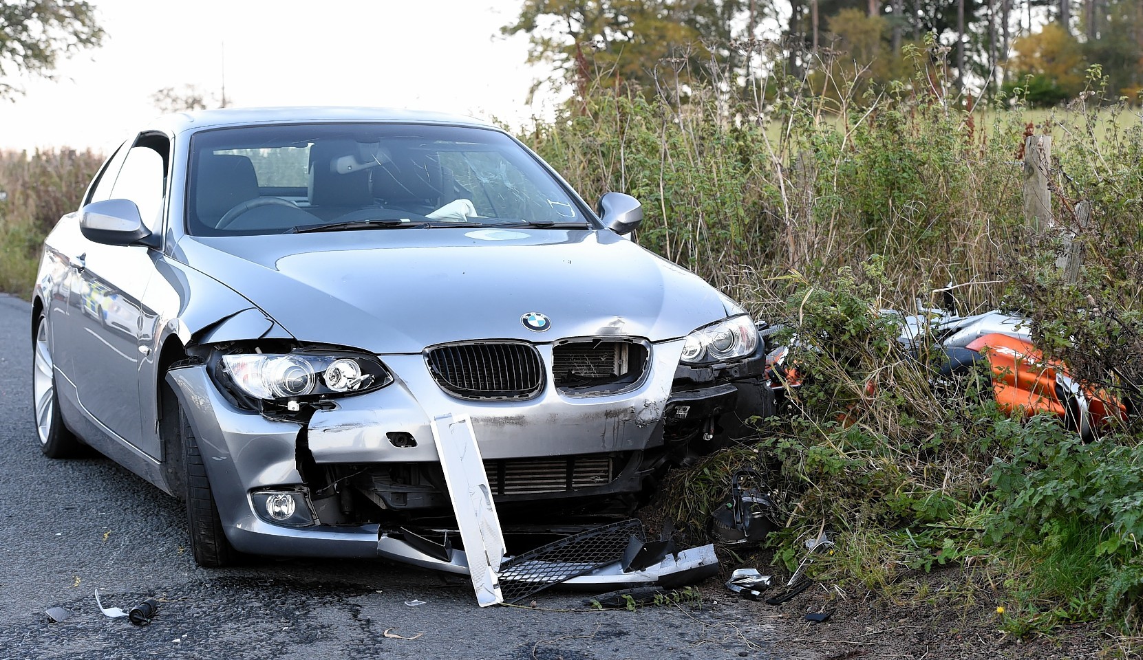 An RTC on the Echt to Banchory road near Echt involving a BMW car and a motorcycle.  Picture by Jim Irvine  16-10-15