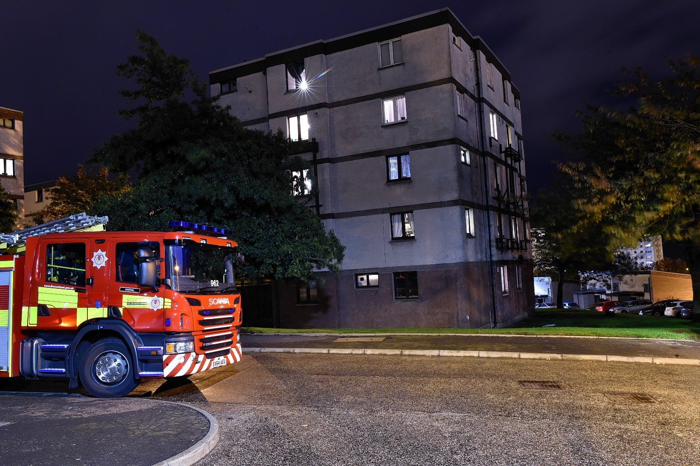 A fire in a bin at a block of flats in Farquhar Avenue, Torry.
Picture by COLIN RENNIE  October 25, 2015.