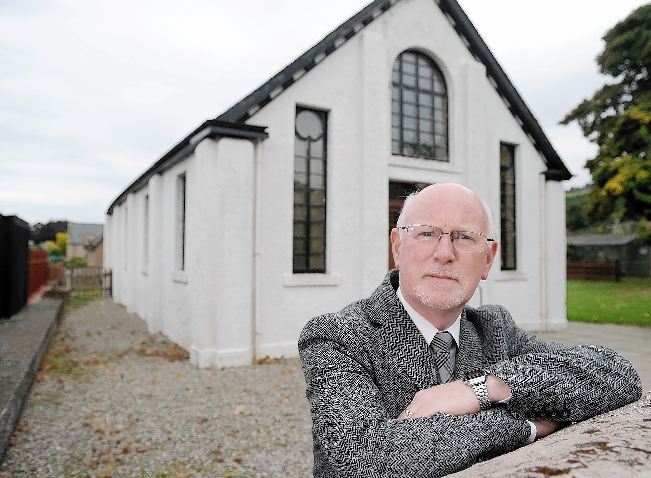 Reverend Sandy Sutherland of the Free Church, Fortrose on the Black Isle which is having to be demolished and rebuilt owing to structural failures.