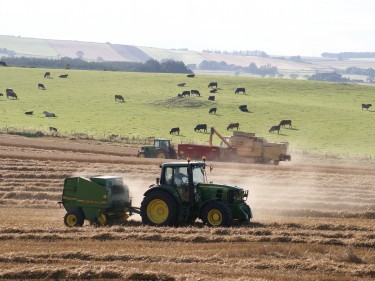Magnus Muir sent in this picture of a busy harvest scene at Honeyneuk Farm, Maud, near Peterhead.