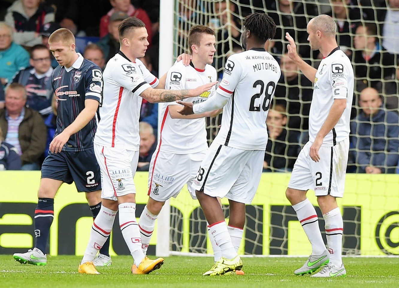 Inverness forward Miles Storey (second from left) celebrates his goal